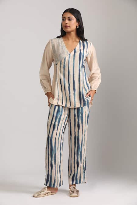 Trendy Tokari Beige Cotton, Silk V-neck Geometric Printed Wrap Top And Pant Set at Aza Fashions Trendy Tokari_Beige Cotton, Silk V-neck Geometric Printed Wrap Top And Pant Set _at_Aza_Fashions