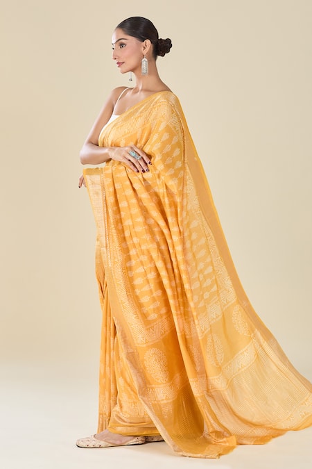 Shop Naintara Bajaj Yellow Viscose Handblock Print Saree With Blouse at Aza Fashions Shop_Naintara Bajaj_Yellow Viscose Handblock Print Saree With Blouse _at_Aza_Fashions