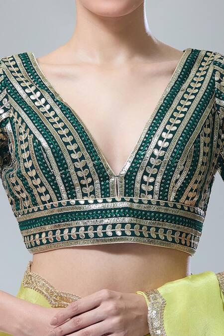 Samyukta Singhania_Emerald Green Sequins, Gota Patti Plunge Leaf Stripe Embroidered Saree Blouse _at_Aza_Fashions