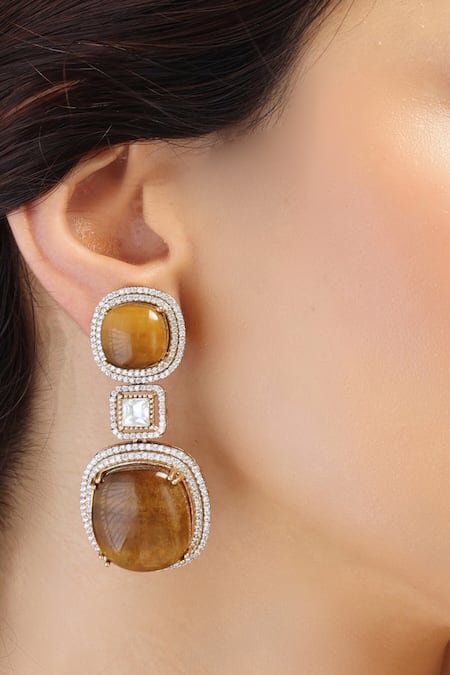 Shop Joules By Radhika Gold Plated Stones Sparkle Embellished Earrings at Aza Fashions Shop_Joules By Radhika_Gold Plated Stones Sparkle Embellished Earrings_at_Aza_Fashions