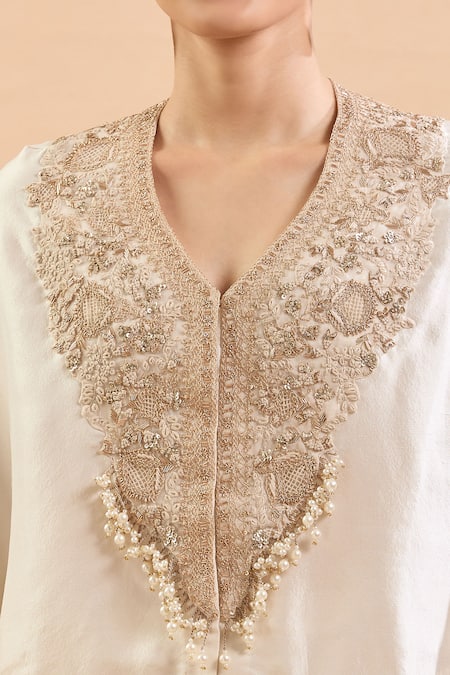 Prisho Ivory Embroidery, Sequins V-neck Floral Kaftan And Draped Pant Set at Aza Fashions Prisho_Ivory Embroidery, Sequins V-neck Floral Kaftan And Draped Pant Set _at_Aza_Fashions