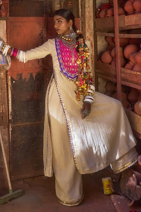 Shop Muskann Kapadiaa Beige Crepe Pearls, Beads, Gota Patti Collared Pink Embroidered Kurta Set at Aza Fashions Shop_Muskann Kapadiaa_Beige Crepe Pearls, Beads, Gota Patti Collared Pink Embroidered Kurta Set _at_Aza_Fashions