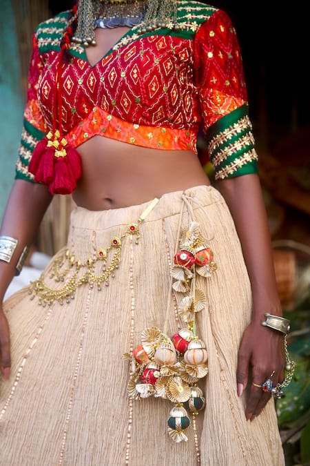 Shop_Muskann Kapadiaa_Red Silk, Crepe Sequins, Zari, Tassels V-neck Gota Embroidered Beige Lehenga Set _Online_at_Aza_Fashions