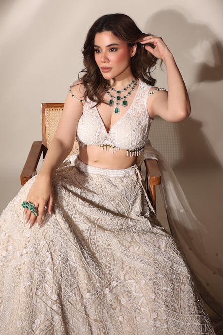 Mehar_Ivory Net Pearls, Sequins Plunge Neck Geometric Embroidered Lehenga Set _at_Aza_Fashions