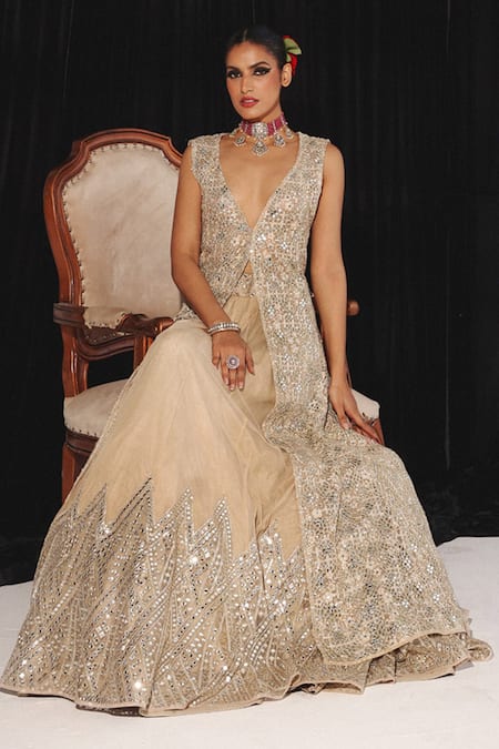 Shop Twenty Nine Gold Net Mirrors, Beads Plunge Neck Jaal Applique Lehenga And Jacket Online at Aza Fashions Shop_Twenty Nine_Gold Net Mirrors, Beads Plunge Neck Jaal Applique Lehenga And Jacket _Online_at_Aza_Fashions