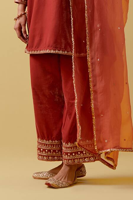 Shop Ikshita Choudhary Peach Velvet, Organza Embroidery, Sequins, Cut Work, Beads Round Kurta Pant Set Online at Aza Fashions Shop_Ikshita Choudhary_Peach Velvet, Organza Embroidery, Sequins, Cut Work, Beads Round Kurta Pant Set _Online_at_Aza_Fashions