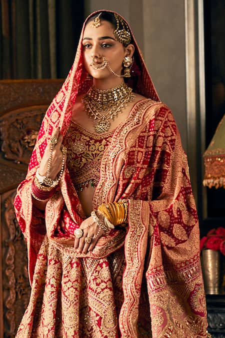 Shop Rimple And Harpreet Narula Red Tulle Beads, Tassels V-neck Mughal Embroidered Lehenga Set at Aza Fashions Shop_Rimple And Harpreet Narula_Red Tulle Beads, Tassels V-neck Mughal Embroidered Lehenga Set _at_Aza_Fashions