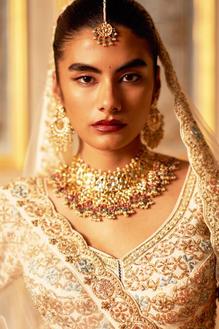 Buy Angad Singh Ivory Silk, Crepe Embroidery, Sequins Asymmetric Lehenga Set With Dupattas Buy_Angad Singh_Ivory Silk, Crepe Embroidery, Sequins Asymmetric Lehenga Set With Dupattas