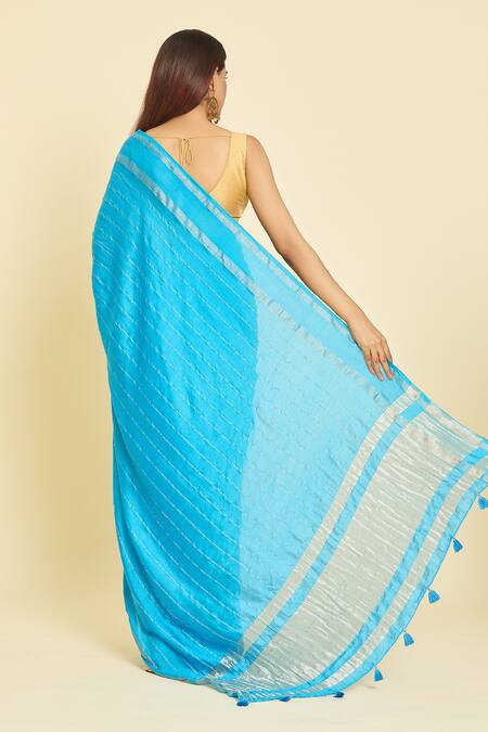 Shop Samyukta Singhania Blue Chanderi Tassels, Zari Detailed Saree With Unstitched Blouse Piece at Aza Fashions Shop_Samyukta Singhania_Blue Chanderi Tassels, Zari Detailed Saree With Unstitched Blouse Piece_at_Aza_Fashions