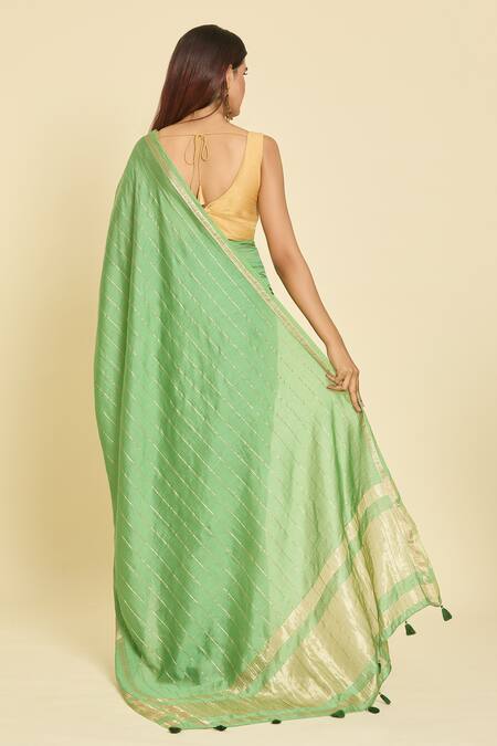 Shop Samyukta Singhania Green Chanderi Zari Striped Saree With Unstitched Blouse Piece at Aza Fashions Shop_Samyukta Singhania_Green Chanderi Zari Striped Saree With Unstitched Blouse Piece_at_Aza_Fashions