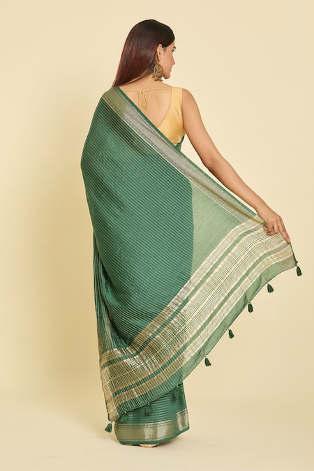 Shop Samyukta Singhania Green Chanderi Zari, Tassels Round Stripe Saree With Unstitched Blouse Piece at Aza Fashions Shop_Samyukta Singhania_Green Chanderi Zari, Tassels Round Stripe Saree With Unstitched Blouse Piece_at_Aza_Fashions