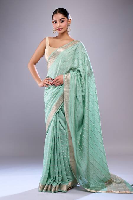 Shop Samyukta Singhania Green Chanderi, Cotton, Silk Tassels Striped Saree With Floral Blouse Piece at Aza Fashions Shop_Samyukta Singhania_Green Chanderi, Cotton, Silk Tassels Striped Saree With Floral Blouse Piece_at_Aza_Fashions