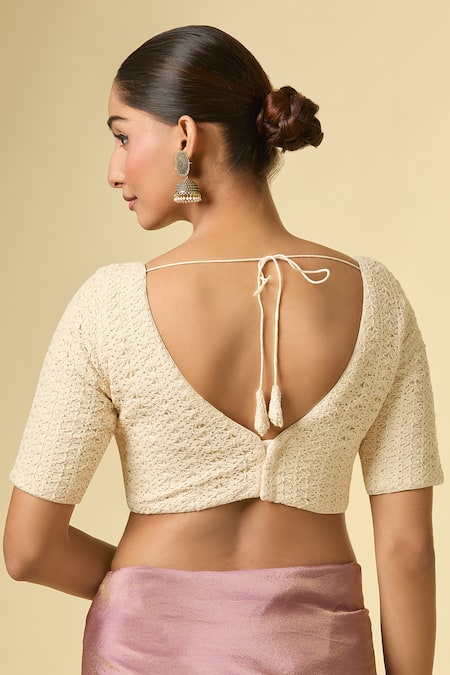Shop Naintara Bajaj Cream Lace V-neck Embellished V Blouse at Aza Fashions Shop_Naintara Bajaj_Cream Lace V-neck Embellished V Blouse _at_Aza_Fashions