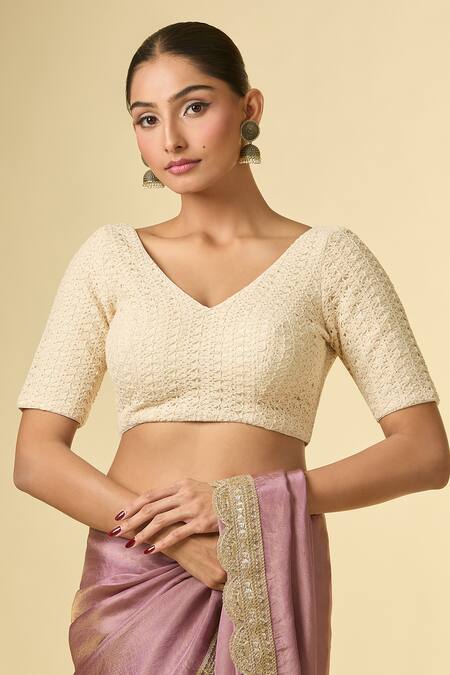 Shop Naintara Bajaj Cream Lace V-neck Embellished V Blouse Online at Aza Fashions Shop_Naintara Bajaj_Cream Lace V-neck Embellished V Blouse _Online_at_Aza_Fashions