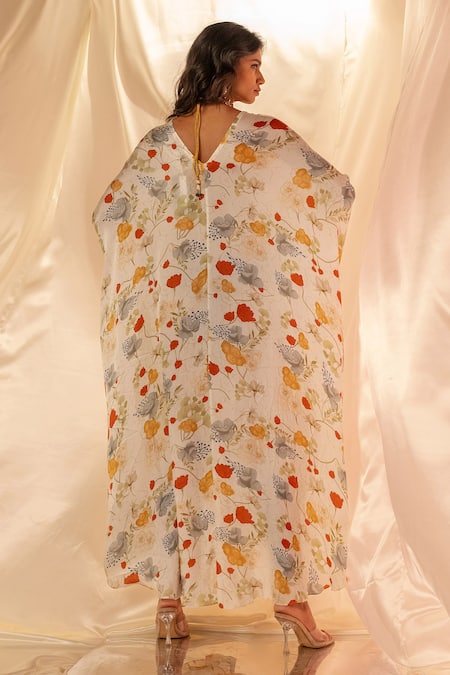 Shop Label Shristi Chetani White Cotton Embroidery V-neck Floral Kaftan Dress at Aza Fashions Shop_Label Shristi Chetani_White Cotton Embroidery V-neck Floral Kaftan Dress_at_Aza_Fashions