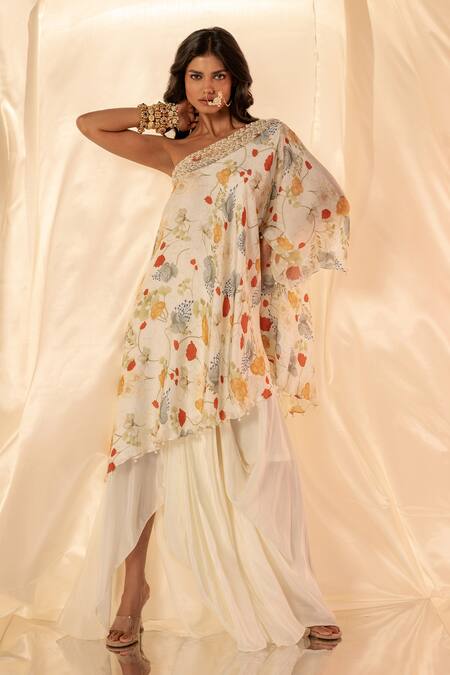 Label Shristi Chetani White Crepe, Bamboo Asymmetric One Shoulder Embellished Top And Drape Skirt Online at Aza Fashions Label Shristi Chetani_White Crepe, Bamboo Asymmetric One Shoulder Embellished Top And Drape Skirt_Online_at_Aza_Fashions