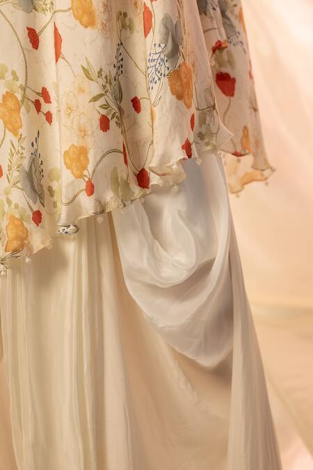 Shop Label Shristi Chetani White Crepe, Bamboo Asymmetric One Shoulder Embellished Top And Drape Skirt Online at Aza Fashions Shop_Label Shristi Chetani_White Crepe, Bamboo Asymmetric One Shoulder Embellished Top And Drape Skirt_Online_at_Aza_Fashions