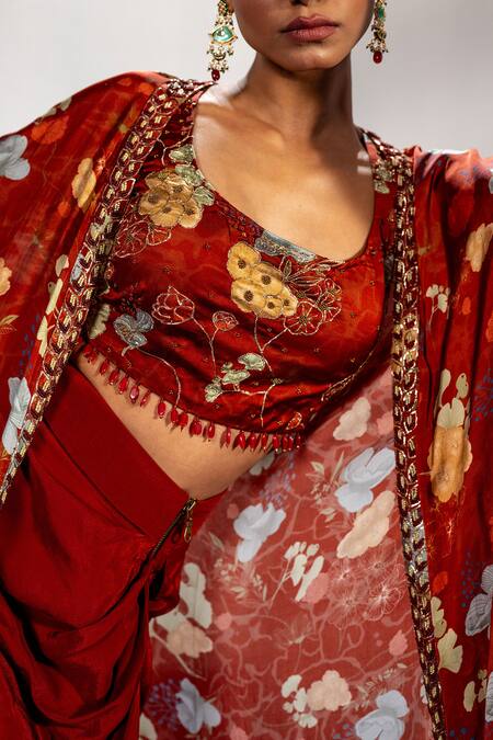 Label Shristi Chetani_Rust Tassels, Embroidery Round Neck Cape Set_at_Aza_Fashions