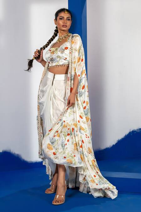 Buy Label Shristi Chetani White Satin, Crepe Embroidery Round Neck Cape Set With Drape Skirt Online at Aza Fashions Buy_Label Shristi Chetani_White Satin, Crepe Embroidery Round Neck Cape Set With Drape Skirt_Online_at_Aza_Fashions