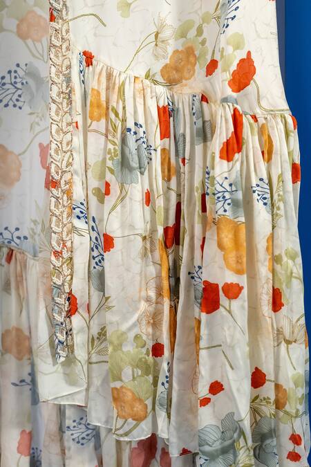 Label Shristi Chetani White Satin, Crepe Embroidery Round Neck Cape Set With Drape Skirt at Aza Fashions Label Shristi Chetani_White Satin, Crepe Embroidery Round Neck Cape Set With Drape Skirt_at_Aza_Fashions