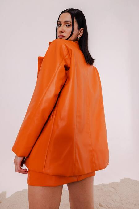 Shop_July Issue_Orange Faux Leather Open Neck Solid Jacket And Mini Skirt Set _at_Aza_Fashions