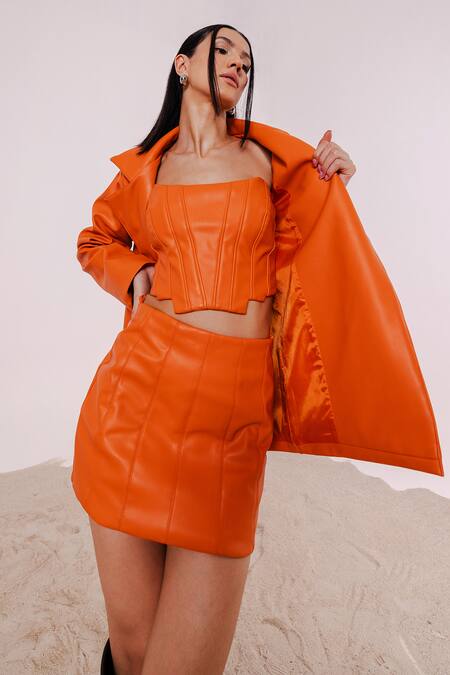 July Issue_Orange Faux Leather Open Neck Solid Jacket And Mini Skirt Set _Online_at_Aza_Fashions