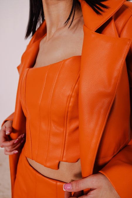 Shop_July Issue_Orange Faux Leather Open Neck Solid Jacket And Mini Skirt Set _Online_at_Aza_Fashions