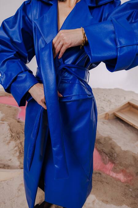 July Issue Blue Faux Leather, Taffeta Collared Solid Trench Jacket at Aza Fashions July Issue_Blue Faux Leather, Taffeta Collared Solid Trench Jacket _at_Aza_Fashions