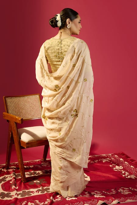 Komal Shah Beige Floral Jaal Saree With Striped Blouse 