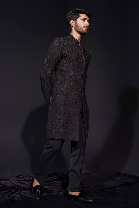Shop Niloufer By Aasif Ally Black Silk Cut Work Cutdana Sherwani And Trouser Set at Aza Fashions Shop_Niloufer By Aasif Ally_Black Silk Cut Work Cutdana Sherwani And Trouser Set _at_Aza_Fashions