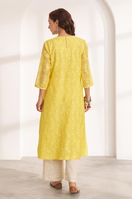 Shop_Vaaya_Yellow Chanderi Embroidery, Tassels Round Neck Lotus Silk Kurta And Dupatta Set _at_Aza_Fashions