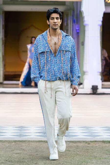 Shop Mandira Wirk Resort Ivory Lycra Resort Trousers Online at Aza Fashions Shop_Mandira Wirk Resort_Ivory Lycra Resort Trousers _Online_at_Aza_Fashions