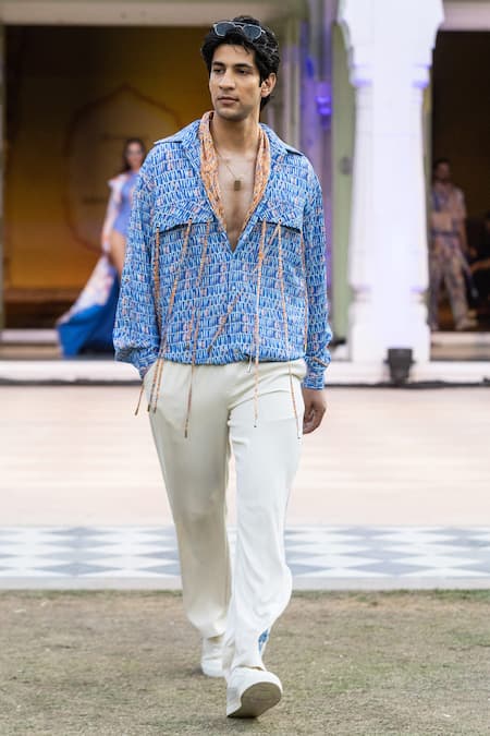 Shop Mandira Wirk Resort Ivory Lycra Resort Trousers at Aza Fashions Shop_Mandira Wirk Resort_Ivory Lycra Resort Trousers _at_Aza_Fashions