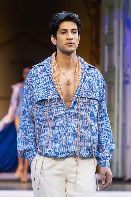 Mandira Wirk Resort Ivory Lycra Resort Trousers at Aza Fashions Mandira Wirk Resort_Ivory Lycra Resort Trousers _at_Aza_Fashions