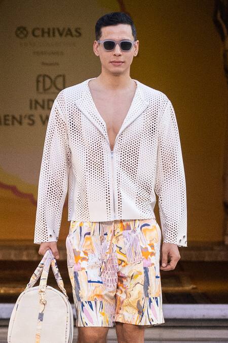 Mandira Wirk Resort Ivory Cut Work Designer Laser Jacket Online at Aza Fashions Mandira Wirk Resort_Ivory Cut Work Designer Laser Jacket _Online_at_Aza_Fashions