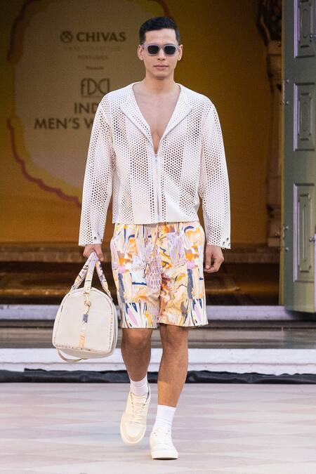 Buy Mandira Wirk Resort Ivory Cut Work Designer Laser Jacket Online at Aza Fashions Buy_Mandira Wirk Resort_Ivory Cut Work Designer Laser Jacket _Online_at_Aza_Fashions