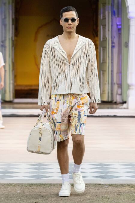 Shop Mandira Wirk Resort Ivory Cut Work Designer Laser Jacket Online at Aza Fashions Shop_Mandira Wirk Resort_Ivory Cut Work Designer Laser Jacket _Online_at_Aza_Fashions