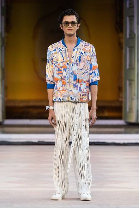 Mandira Wirk Resort Ivory Faux Leather Laser Cut Casual Trousers Online at Aza Fashions Mandira Wirk Resort_Ivory Faux Leather Laser Cut Casual Trousers _Online_at_Aza_Fashions