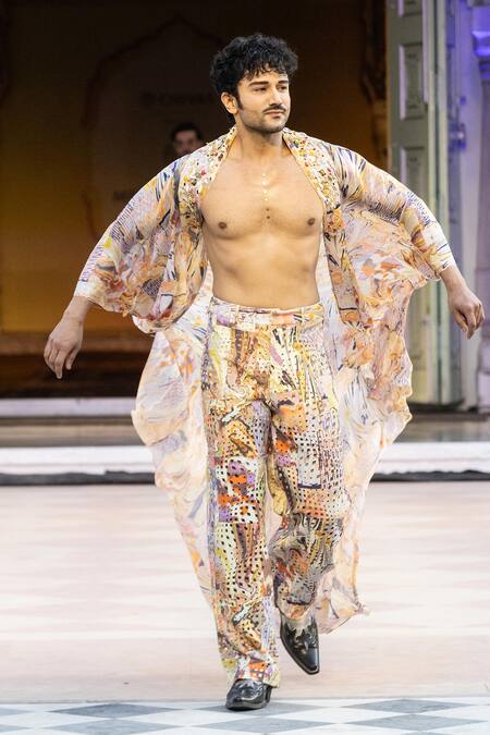 Shop_Mandira Wirk Resort_Yellow Chiffon Flared Jacket With Gold Chunk Emb _Online_at_Aza_Fashions