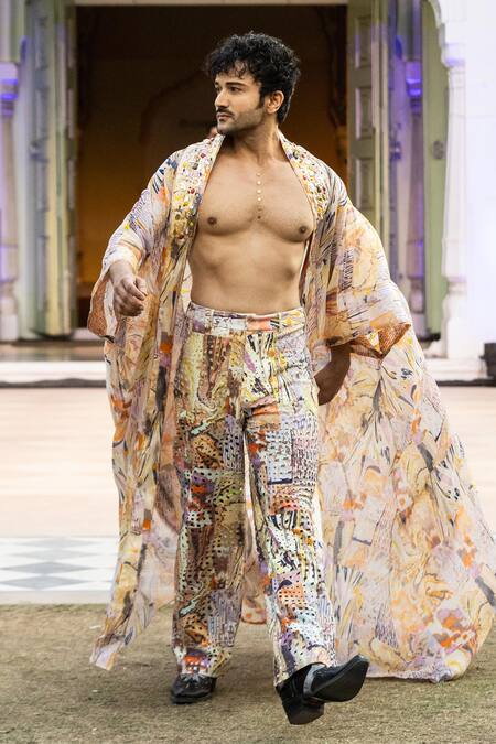 Mandira Wirk Resort_Yellow Chiffon Flared Jacket With Gold Chunk Emb _at_Aza_Fashions