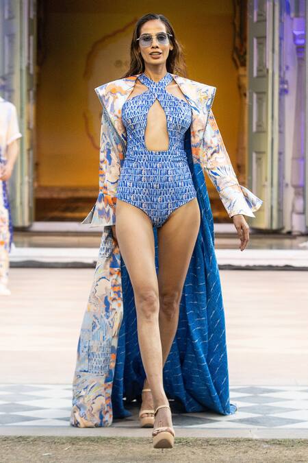 Mandira Wirk Resort Blue Polyester Keyhole Neck Ocean Bodysuit And Cape Set at Aza Fashions Mandira Wirk Resort_Blue Polyester Keyhole Neck Ocean Bodysuit And Cape Set _at_Aza_Fashions