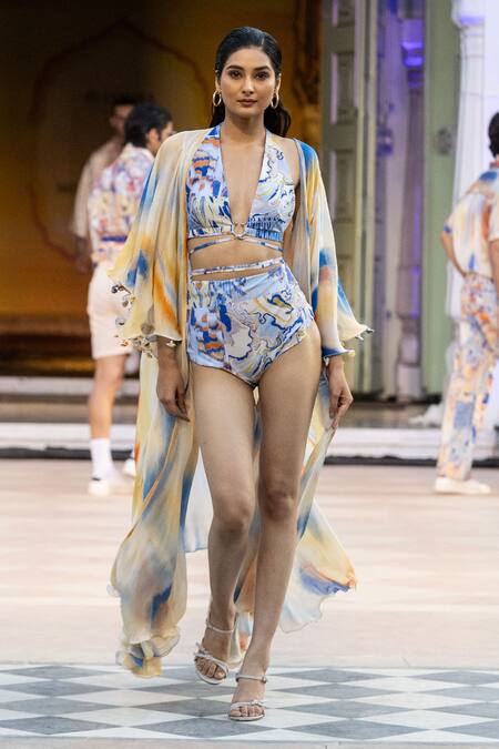 Buy Mandira Wirk Resort Yellow Pom-poms V-neck Printed Strokes Cape Online at Aza Fashions Buy_Mandira Wirk Resort_Yellow Pom-poms V-neck Printed Strokes Cape _Online_at_Aza_Fashions