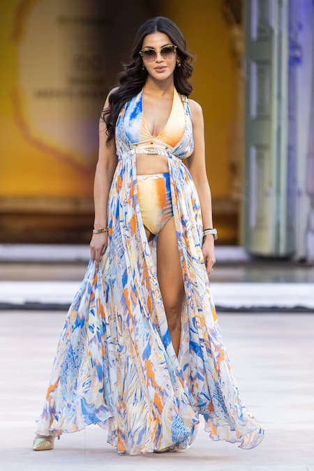 Shop_Mandira Wirk Resort_Yellow Lycra Halter Neck Printed Bodysuit _Online_at_Aza_Fashions