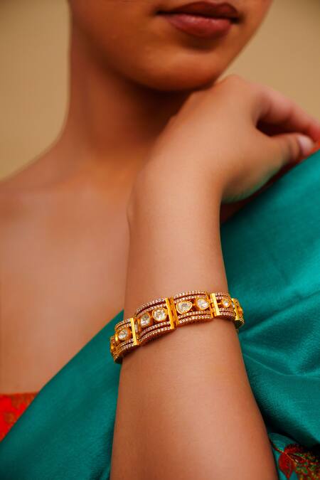 Shop Zevar By Geeta Gold Plated Imitation Diamonds Moissanite Kada Bracelet Online at Aza Fashions Shop_Zevar By Geeta_Gold Plated Imitation Diamonds Moissanite Kada Bracelet _Online_at_Aza_Fashions