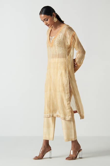 Shop Studio Bagechaa Yellow Chanderi Embroidery, Sequins V-neck, Round Striped Kesar Kurta Pant Set at Aza Fashions Shop_Studio Bagechaa_Yellow Chanderi Embroidery, Sequins V-neck, Round Striped Kesar Kurta Pant Set _at_Aza_Fashions