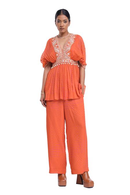 Surbhi Gupta_Orange Georgette Pearls, Mirrors V-neck Peplum Top And Printed Trouser Set _Online_at_Aza_Fashions