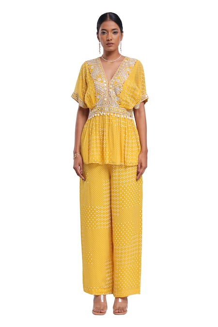 Surbhi Gupta_Yellow Georgette, Linen Pearls, Tassels V-neck Peplum Top And Printed Trouser Set _Online_at_Aza_Fashions
