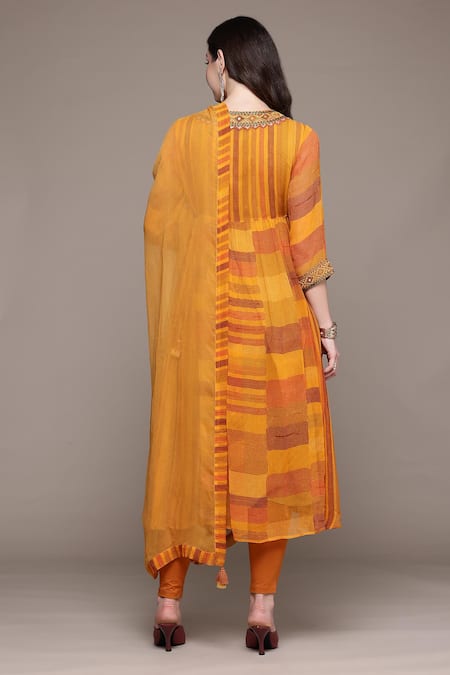 Shop Ritu Kumar Orange Cotton Embroidery Split V-neck Bauhaus Print Kurta Set at Aza Fashions Shop_Ritu Kumar_Orange Cotton Embroidery Split V-neck Bauhaus Print Kurta Set _at_Aza_Fashions