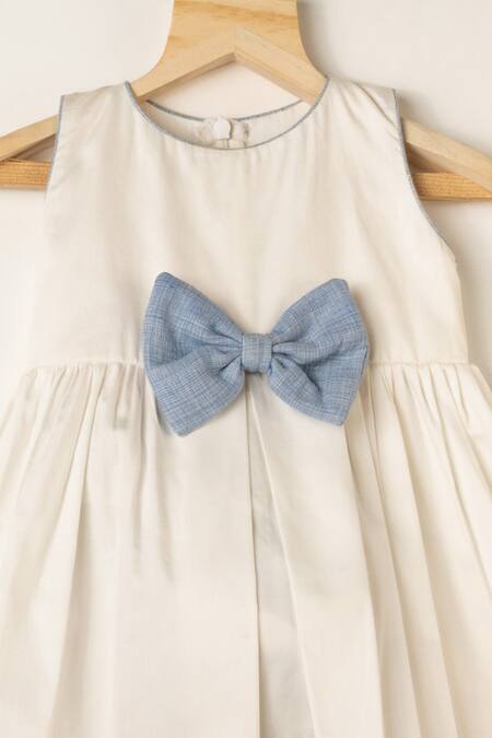 Darleen Kids Couture White Cotton Dress With Bow Detail Online at Aza Fashions Darleen Kids Couture_White Cotton Dress With Bow Detail _Online_at_Aza_Fashions