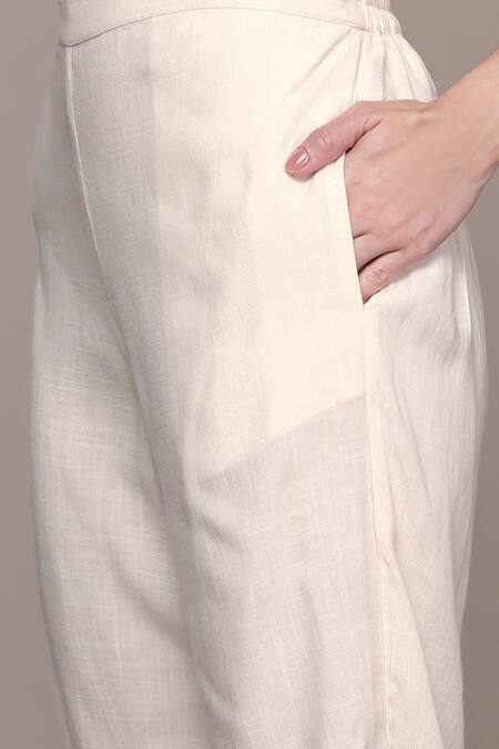 Ritu Kumar, Ri.Ritu Kumar, aarke Ritu Kumar Cream Cotton Embroidery, Tassels Round Neck Phulkari Printed Kurta Set With Pant Online at Aza Fashions Ritu Kumar, Ri.Ritu Kumar, aarke Ritu Kumar_Cream Cotton Embroidery, Tassels Round Neck Phulkari Printed Kurta Set With Pant_Online_at_Aza_Fashions